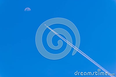 Abstract soft focus the airplane with white smoke and blue sky. Stock Photo