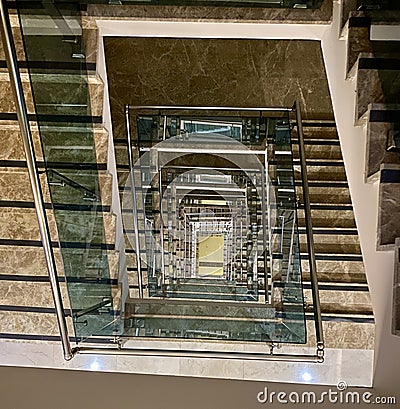 Abstract squares stairwell with glass edges. Stock Photo