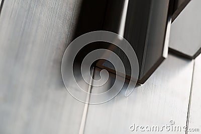 Abstract stack of aluminium profiles close up, industrial background macro Stock Photo