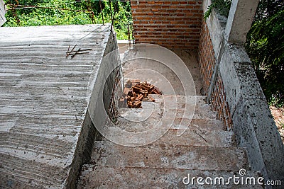 Abstract stairs and brick wall under construction Stock Photo