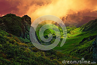Abstract stone giant and fog over mountain valley Stock Photo