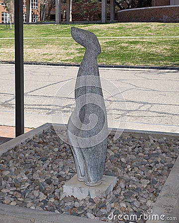 Abstract stone sculpture of the figure of a woman at Texas Women`s University in Denton. Editorial Stock Photo