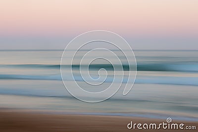 Abstract sunrise ocean background with blurred panning motion Stock Photo