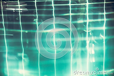 Abstract swimming pool background with transparent turquoise water and net pattern in vintage style Stock Photo