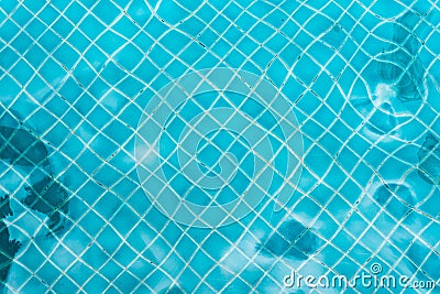 Abstract swimming pool bottom caustics ripple and flow with waves background. Summer background. Texture of water surface. Stock Photo