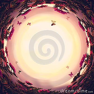 abstract swirled background of magical fairytale flowers and butterflies at sunset light Stock Photo