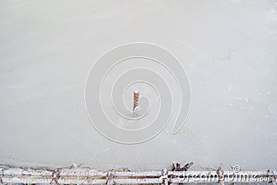 Abstract texture and background of rusted steel in the wet plastered cement on the floor Stock Photo