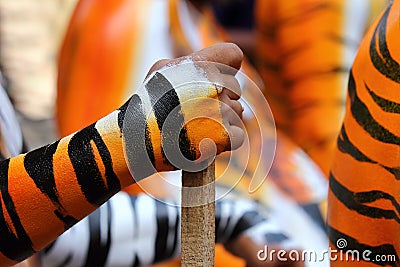 Abstract tiger stripes on a human hand Stock Photo