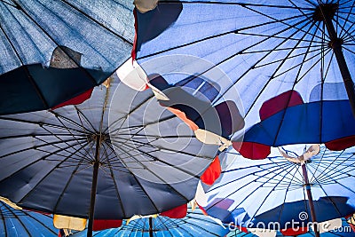 Abstract under big umbrella Stock Photo