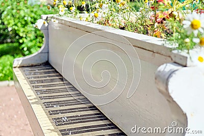 Abstract upright pianos in wood with flowers Stock Photo