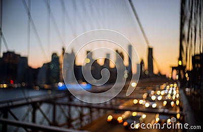 Abstract urban night light bokeh defocused Brooklyn Bridge at twilight in New York Citynight Stock Photo