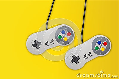 Abstract video gaming controller: Vintage gamepad on yellow background Stock Photo