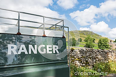 Abstract view of a National Parks 4x4 vehicle parked at a rural location. Editorial Stock Photo