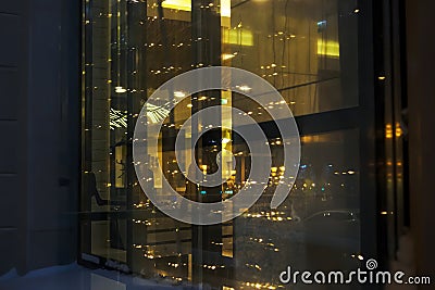 Abstract view of the reflection in the night window of lights Stock Photo