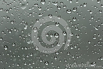 Abstract Water drop on glass mirror background. Stock Photo