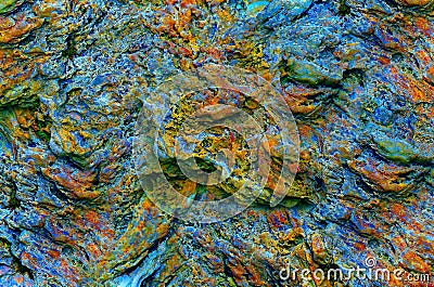 Abstract weathered colorful rock pattern Stock Photo