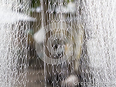 Abstract white textile blurry background. Water like abstraction in blur. Stock Photo