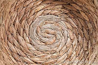 Abstract wicker seagrass basket texture background. Circle spiral pattern. Natural storage basket Stock Photo