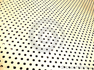 Abstract Yellow Metal with holes Stock Photo