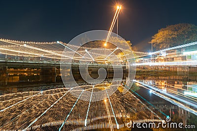 Abstract zoom blur effect of nights lights across Narawat Bridge Stock Photo