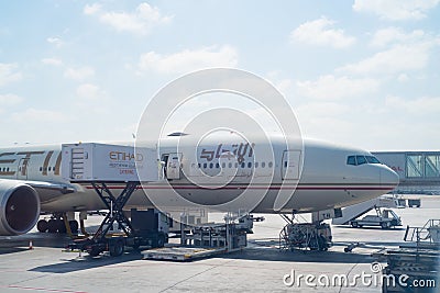 ABU DHABI - FEBRUARY 13: Airplane of Etihad airways land in Abu Dhabi International Airport. February 12, 2016 in Abu Dhabi, Unite Editorial Stock Photo