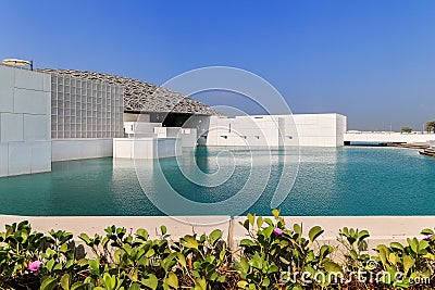 he exterior of the famous Louvre museum with the floating and roof in Abu Dhabi Editorial Stock Photo