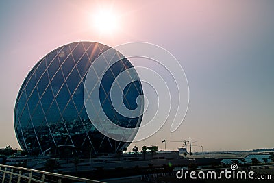 The Aldar Headquarters building is the first circular building of it's kind at Abu Dhabi, United Arab Emirates. Editorial Stock Photo