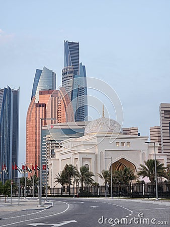 Abudhabi palace and skyscrapers Stock Photo