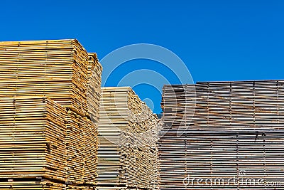 Wood planks stacked in sawmill yard Stock Photo
