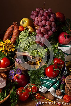 Abundance vegetables, fruits, meat products on the table Stock Photo