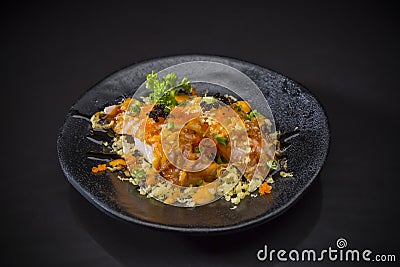 Aburi Spicy Salmon Nigiri, Burned Salmon Sushi and topped with Shrimp Eggs Stock Photo