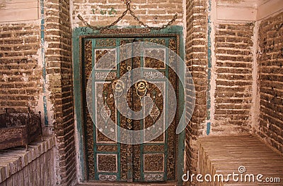 ABYANEH, IRAN- SEPTEMBER 23, 2018: The Great Mosque entrance double-door in the mountain village Abyaneh. Iran Stock Photo