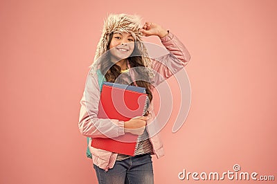 Academic year. Winter semester. Teen with backpack and books. Stylish schoolgirl. Girl little fashionable schoolgirl Stock Photo