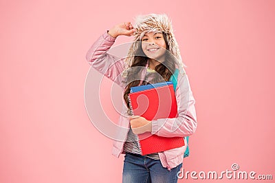 Academic year. Winter semester. Teen with backpack and books. Stylish schoolgirl. Girl little fashionable schoolgirl Stock Photo