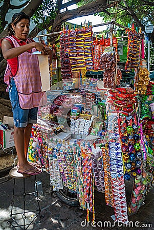 Overloaded mobile candy booth downtown old Acapulco, Mexico Editorial Stock Photo