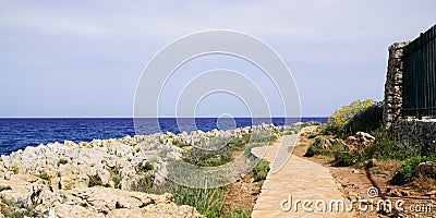 Access sea pathway beach mediterranean coast at Antibes paca France Stock Photo