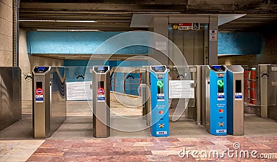 Access to Piata Romana metro station in Bucharest.. Tourniquets access control systemwith VISA logo at a subway entrance Editorial Stock Photo
