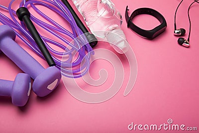 Accessories for doing fitness for weight loss, empty space for text. Pink, woman Stock Photo