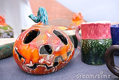 Accessories for halloween party. Jack O Lanterns pumpkin candlestick with smiling face. Happy halloween. Orange colors. - holidays Stock Photo