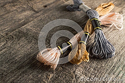 Accessories for hobbies: different colors of thread for embroidery Stock Photo