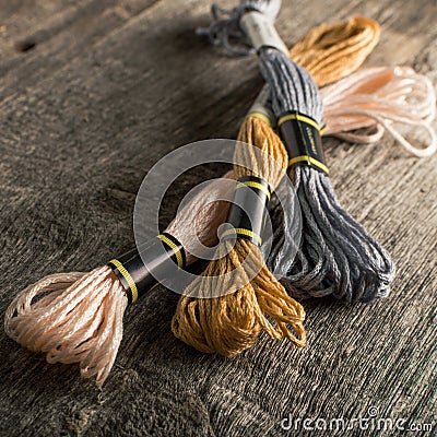 Accessories for hobbies: different colors of thread for embroidery. square Stock Photo