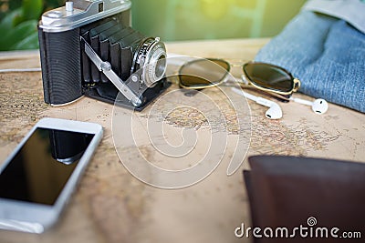 Accessories travel,wallet,photo camera, smart phone,sunglass,smalltalk and travel map Stock Photo