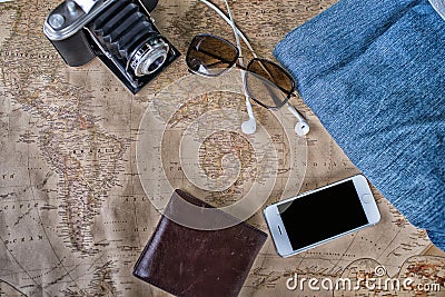 Accessories for travel,wallet,photo camera, smart phone,sunglass,smalltalk and travel map Stock Photo
