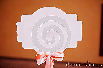 Accessory, white nameboard with nice small bow Stock Photo