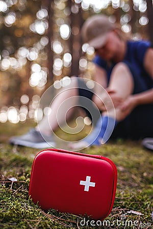 Accident and injury during hiking in nature Stock Photo