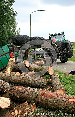 Accident with tractor and tree stumps Stock Photo