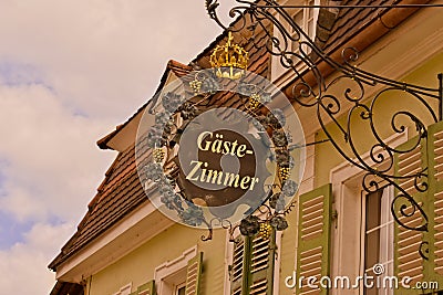 Accomodation sign on a house in Sankt Martin Editorial Stock Photo