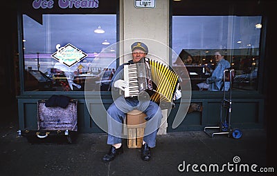 Accordian street musician Editorial Stock Photo