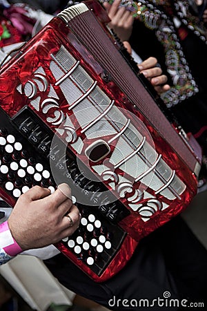 Accordionist playing in a marching band Stock Photo