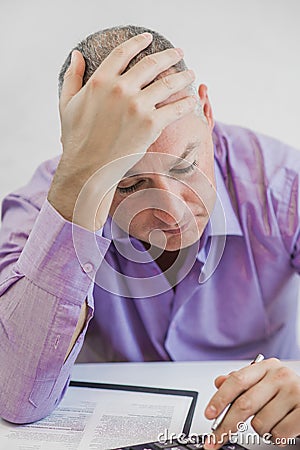 Accountant businessman at work is stressed Stock Photo